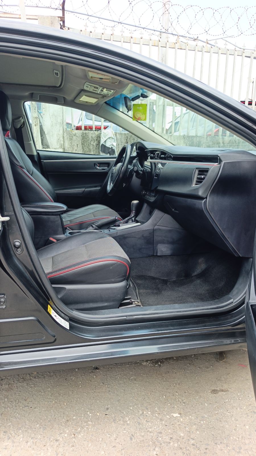 Toyota Corolla S Black Sedan with Alloy Wheels