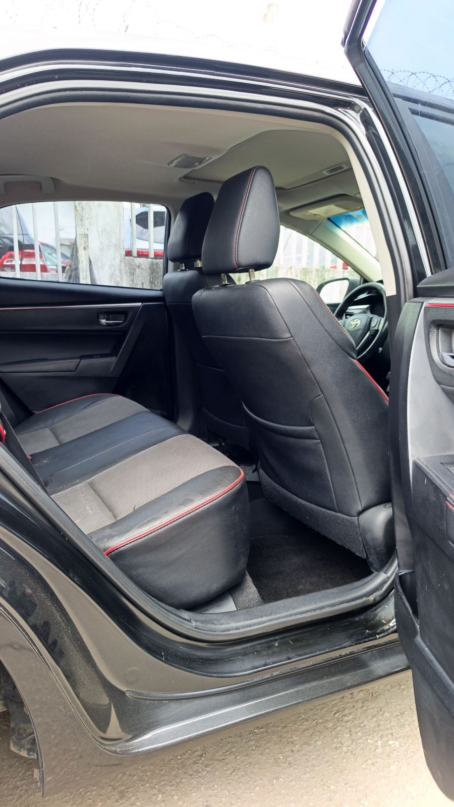 Toyota Corolla S Black Sedan with Alloy Wheels