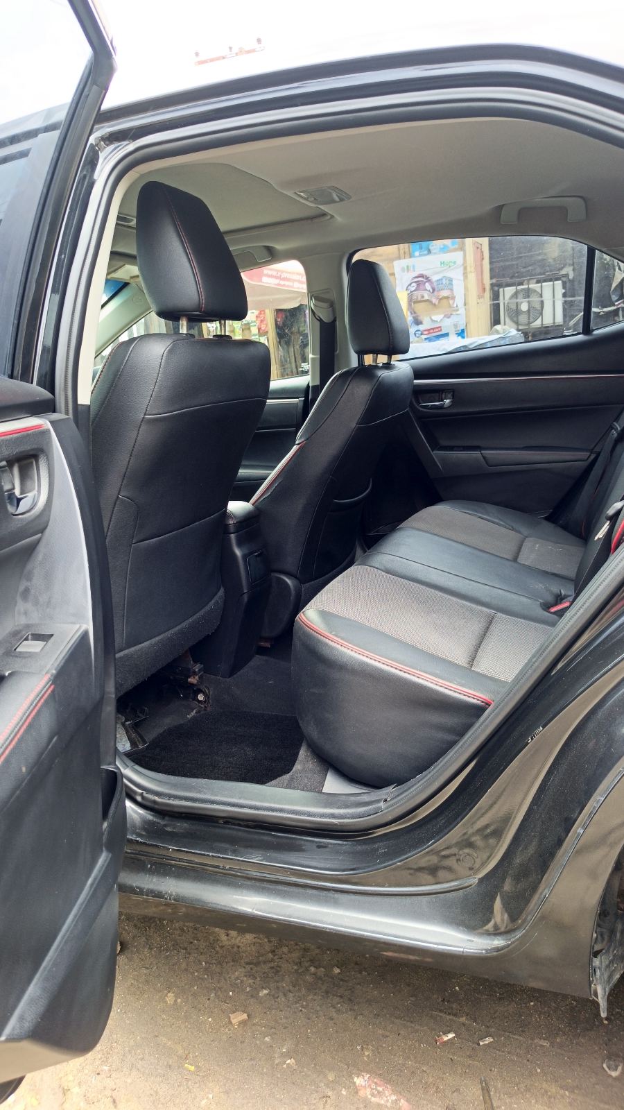 Toyota Corolla S Black Sedan with Alloy Wheels