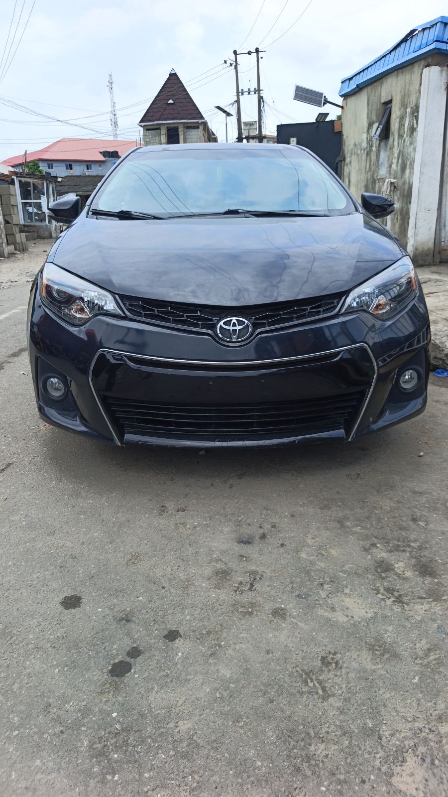 Toyota Corolla S Black Sedan with Alloy Wheels