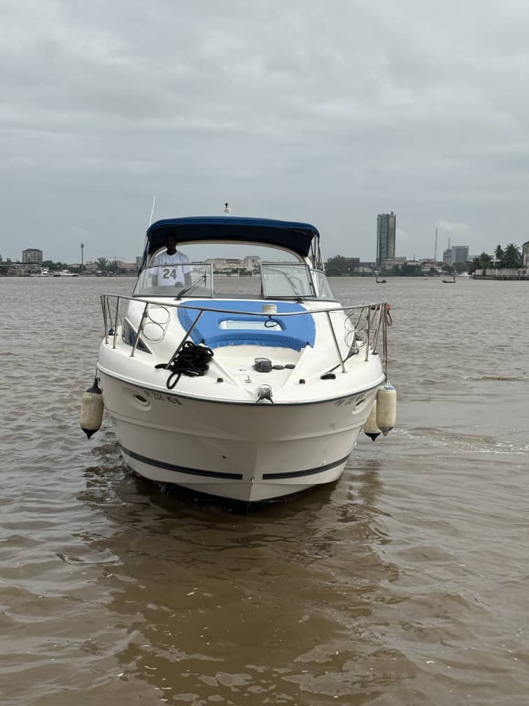 Cabin Cruiser Boat for Rent, White with Blue Seats