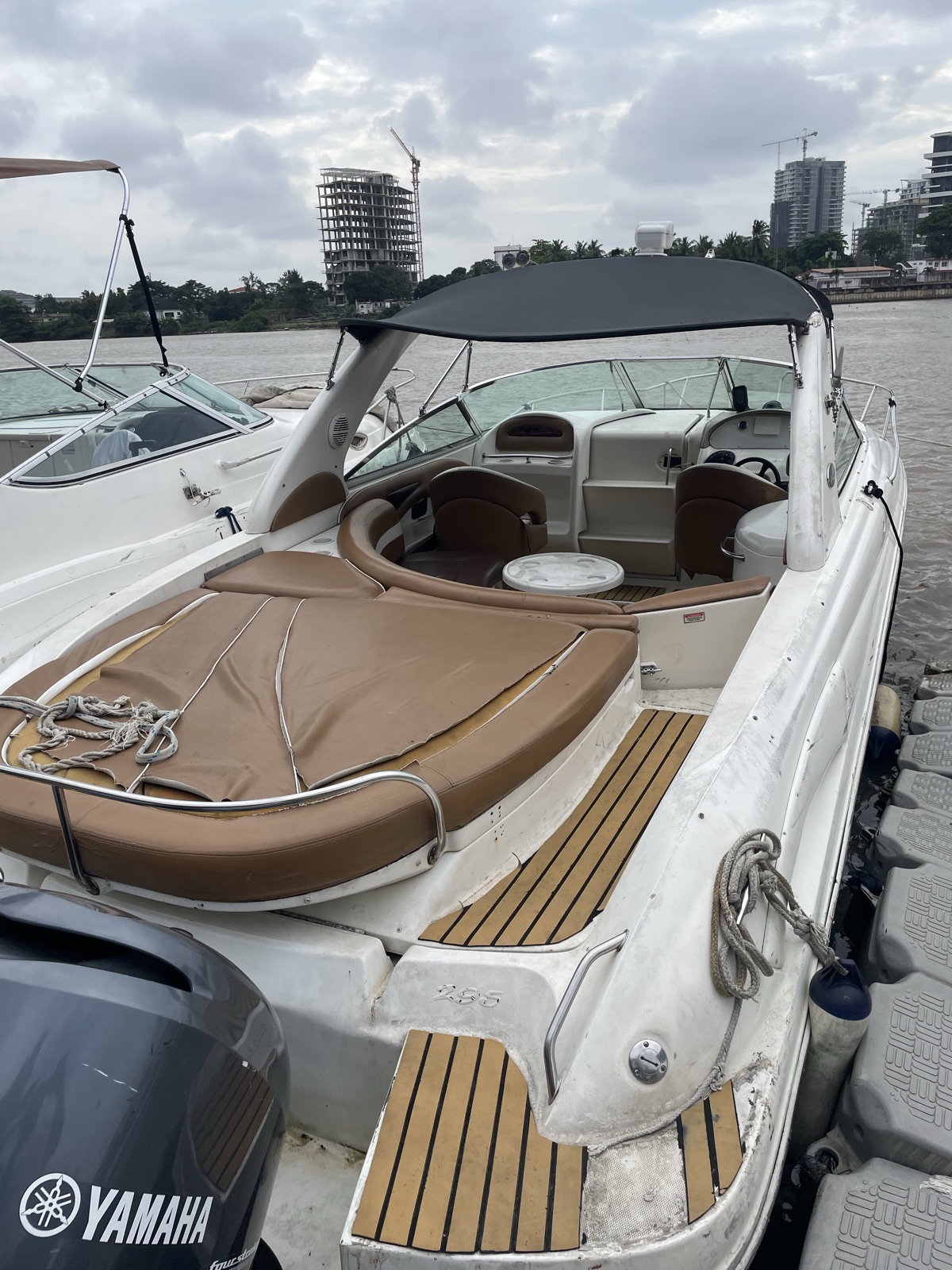 Speed Boat for Rent, White with Brown Seats