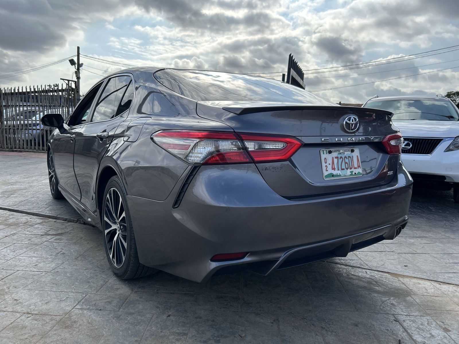2018 Toyota Camry, Dark Grey Sedan with Alloy Wheels